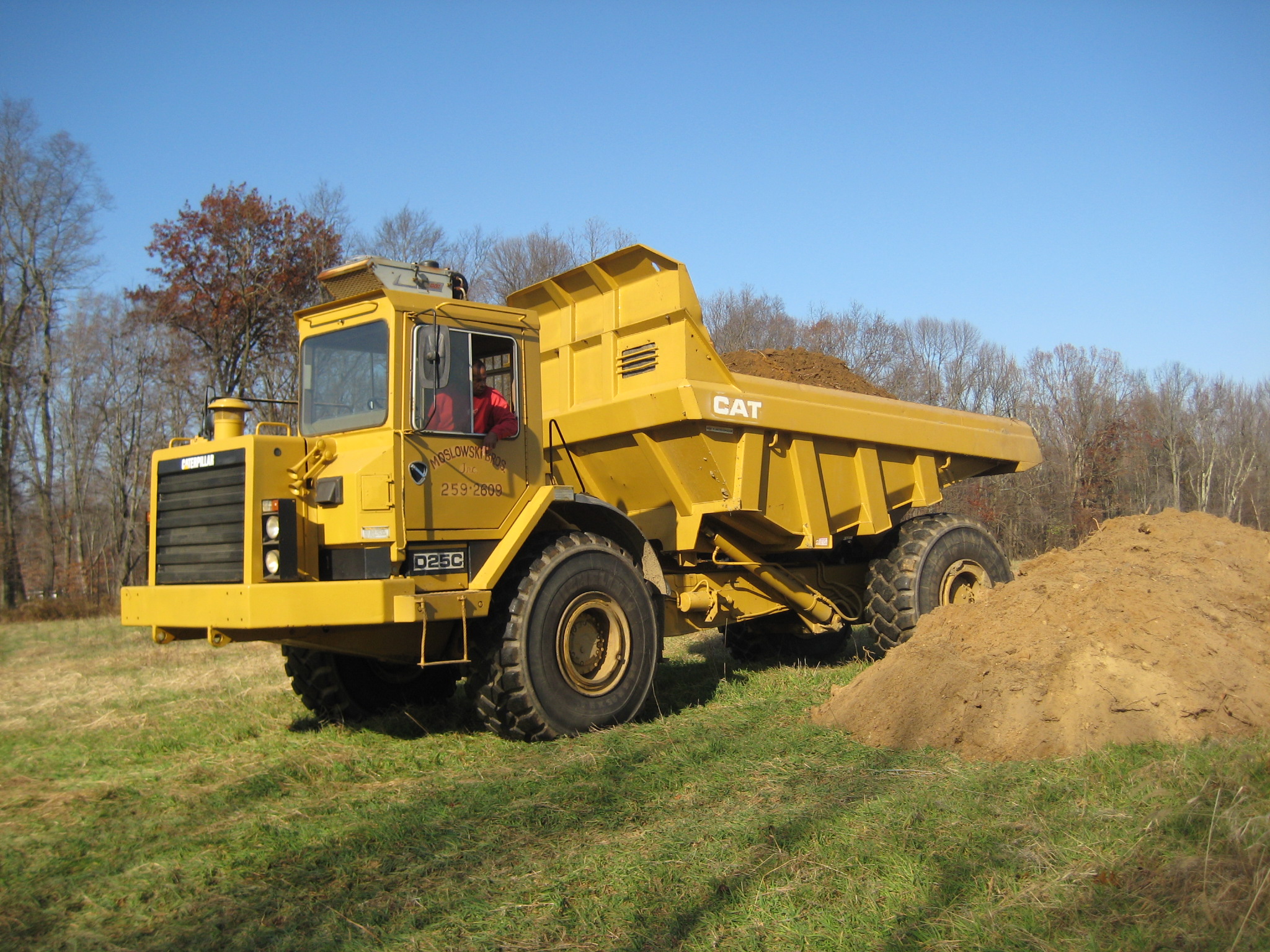 Stockpiling dirt - Farm dump cleanup