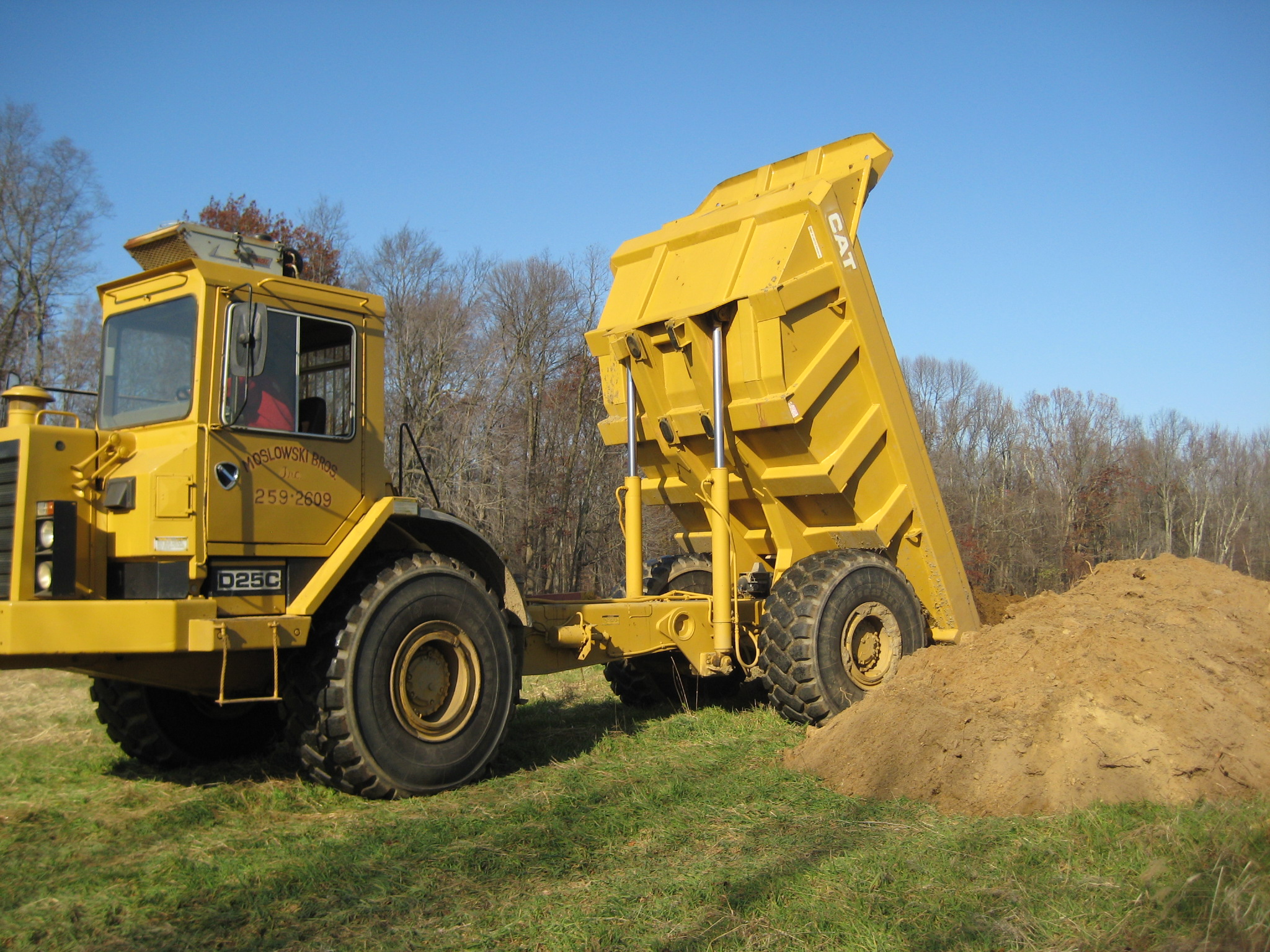 Stockpiling dirt - Farm dump cleanup