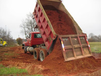 Farm Dump Cleanup - Dumping clean dirt 